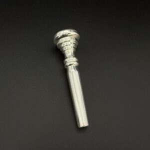 Used MF FBL TS Trumpet Mouthpiece in vintage blank. This mouthpiece is in excellent condition.